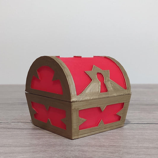 Wooden chest with red interior and star cutout on a wooden surface