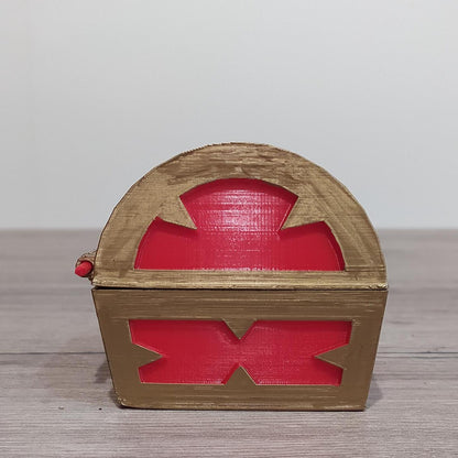 Wooden box with red interior on a wooden surface